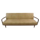 A GREAVES AND THOMAS TEAK FRAMED SOFA BED with shaped arms, covered in beige vinyl, 70cm high x
