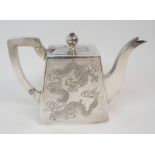 A CHINESE SILVER SQUARE TAPERING TEAPOT with hinged cover, two sides and the cover decorated with