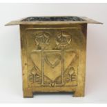 A MARGARET GILMOUR STYLE BRASS JARDINIERE of square form with broad rim, above panelled sides,