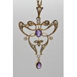 A 9CT GOLD EDWARDIAN PENDANT BROOCH set with amethyst and pearls, dimensions of the pendant 5cm x