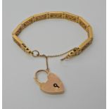 AN UNUSUAL 9CT GOLD FANCY LINK BRACELET WITH HEART SHAPED CLASP length approx 19cm, weight approx