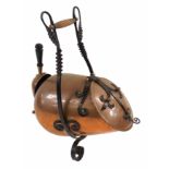 AN ARTS AND CRAFTS COPPER AND WROUGHT IRON COAL DEPOT AND SHOVEL the hinged cover with trefoil strap