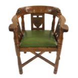 A ROBERT 'MOUSEMAN' THOMPSON OF KILBURN OAK MONK'S CHAIR the curved back rail carved with mask