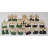 AN EAST INDIAN IVORY CHESS SET probably Berhampore, one set with black stained bases lacking two