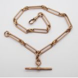 A 9CT ROSE GOLD FANCY FOB CHAIN hallmarked to every long link, 'T' bar and clasp, length 34.5cm,