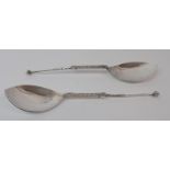 A PAIR OF SILVER SERVING SPOONS by Alexander Ritchie marked Iona AR and Glasgow 1929, the spearpoint