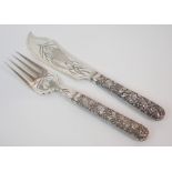 A PAIR OF CHINESE SILVER FISH SERVERS the handles cast with birds amongst blossom, each engraved