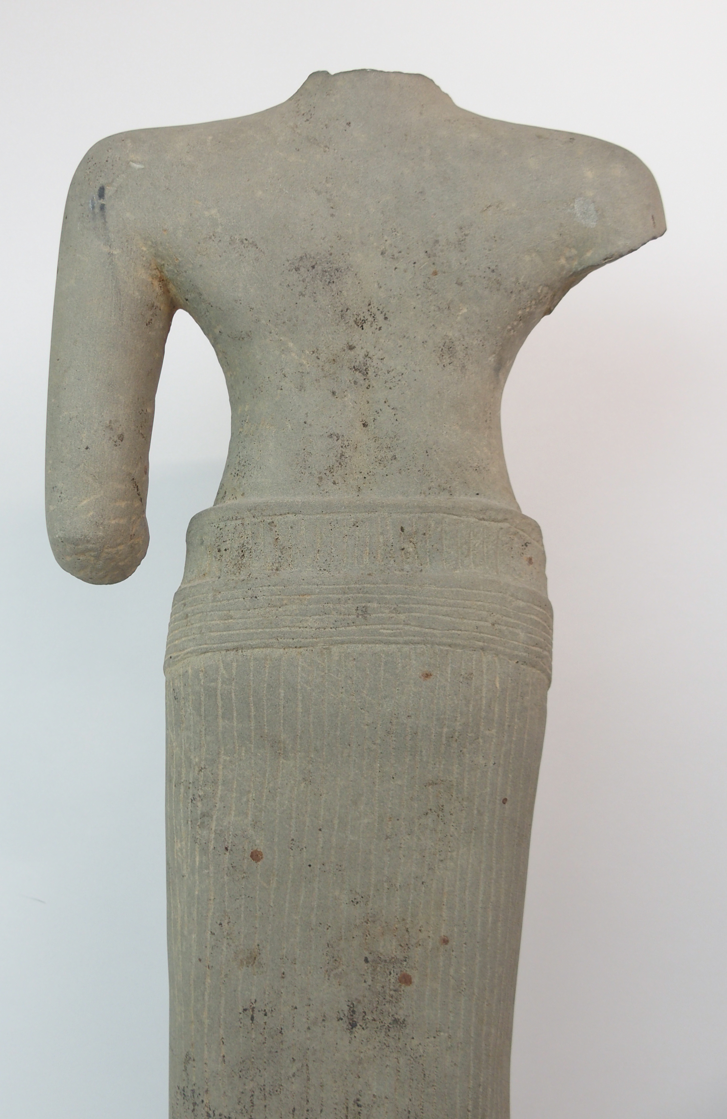 AN ASIAN STONE CARVING OF A FEMALE TORSO bare chested and wearing a ribbon tied patterned dress, ( - Image 9 of 10