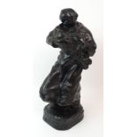 •REGINALD FAIRFAX WELLS (1877-1951) - A MOTHER CRADLING A CHILD bronze sculpture, signed to the