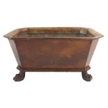 A WILLIAM IV MAHOGANY WINE COOLER the octagonal form with lead interior, the everted rim above