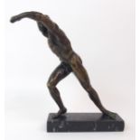 A 19TH CENTURY BRONZE OF A CLASSICAL MAN modelled standing with one arm raised, upon black marble
