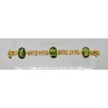 AN 18CT BRACELET SET WITH CHROME DIOPSIDE GEMSTONES possibly of Latvian manufacture, marks stamped