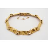 A 14CT GOLD LAPPONIA REINDEER JOTOS BRACELET Designed by Bjorn Weckstrom, circa 1982, with