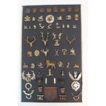 A COLLECTION OF ASSORTED MILITARY BADGES AND INSIGNIA mounted on a card Condition Report: