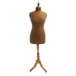 A TAILOR'S DUMMY the stitched torso mounted on a turned baluster stem and on scroll legs, 160cm high