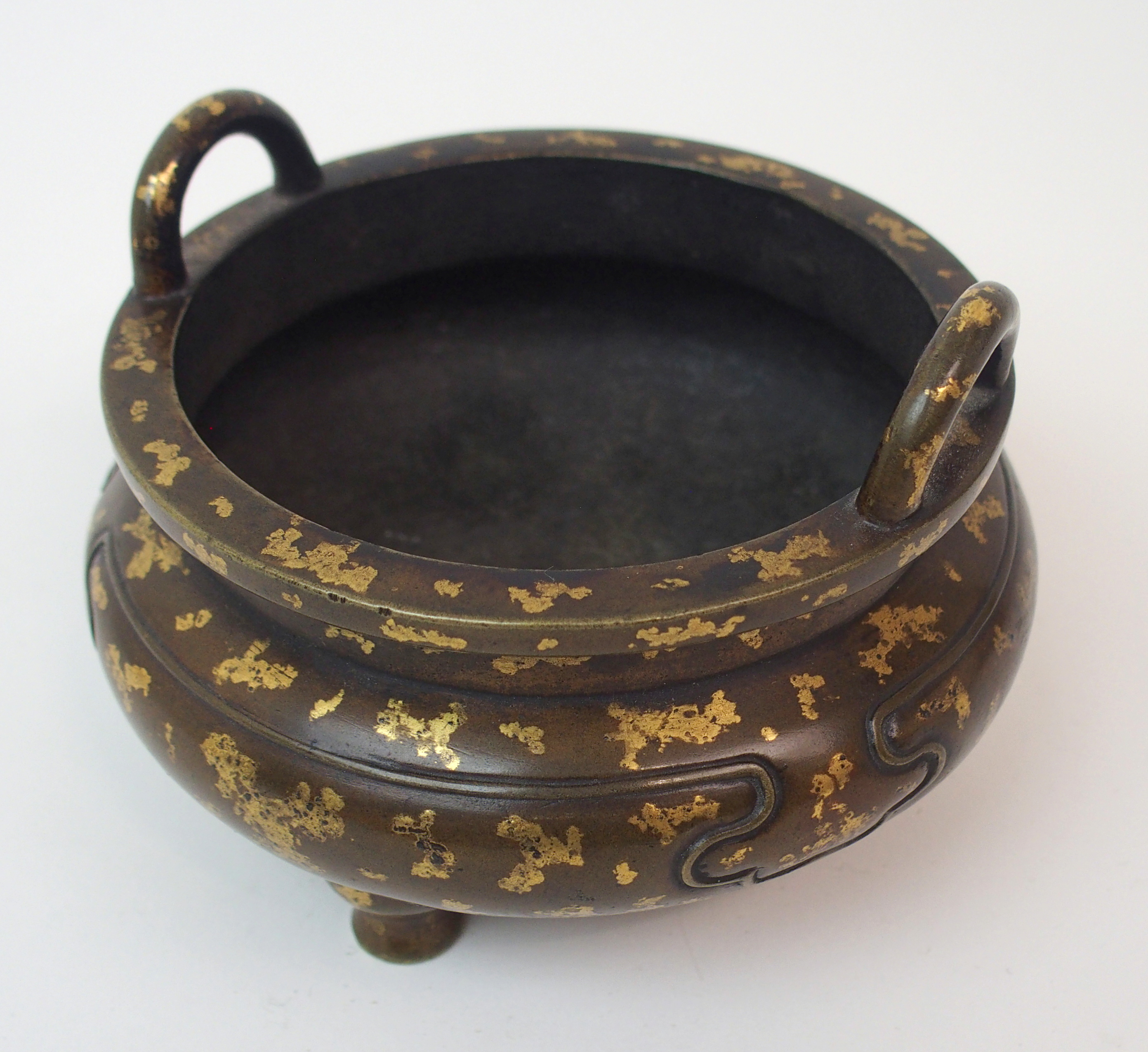 A CHINESE BRONZE GOLD SPLASHED CENSER with a pair of loop handles above a short shoulder cast with - Image 9 of 9