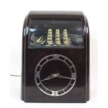 A VITASCOPE INDUSTRIES LTD BAKELITE CASED ELECTRIC SHIP AUTOMATA CLOCK the brown case with a