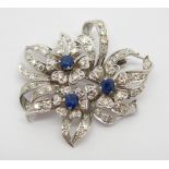 A SAPPHIRE AND DIAMOND FLORAL SPRAY BROOCH set in 18ct white gold and platinum, dimensions 3.5cm x
