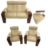 AN EKORNESS STRESSLESS FOUR PIECE RECLINING CREAM LEATHER SUITE with a Bentwood frame, comprising