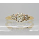 AN 18CT GOLD THREE OLD CUT DIAMOND RING of estimated approx 0.90cts, in classic crown mounts, finger