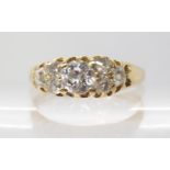 A BRIGHT YELLOW METAL OLD CUT DIAMOND CLUSTER RING the central diamond is estimated approx 0.