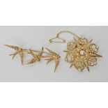 A 15CT GOLD PEARL SET STAR PENDANT BROOCH diameter 3.5cm, weight 7.1gms together with a bright