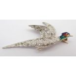 A DIAMOND AND ENAMEL PHEASANT BROOCH mounted in yellow and white metal set with estimated approx 0.