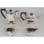 A FOUR PIECE SILVER TEA SERVICE maker's marks SL, Sheffield 1941, of rectangular form with canted