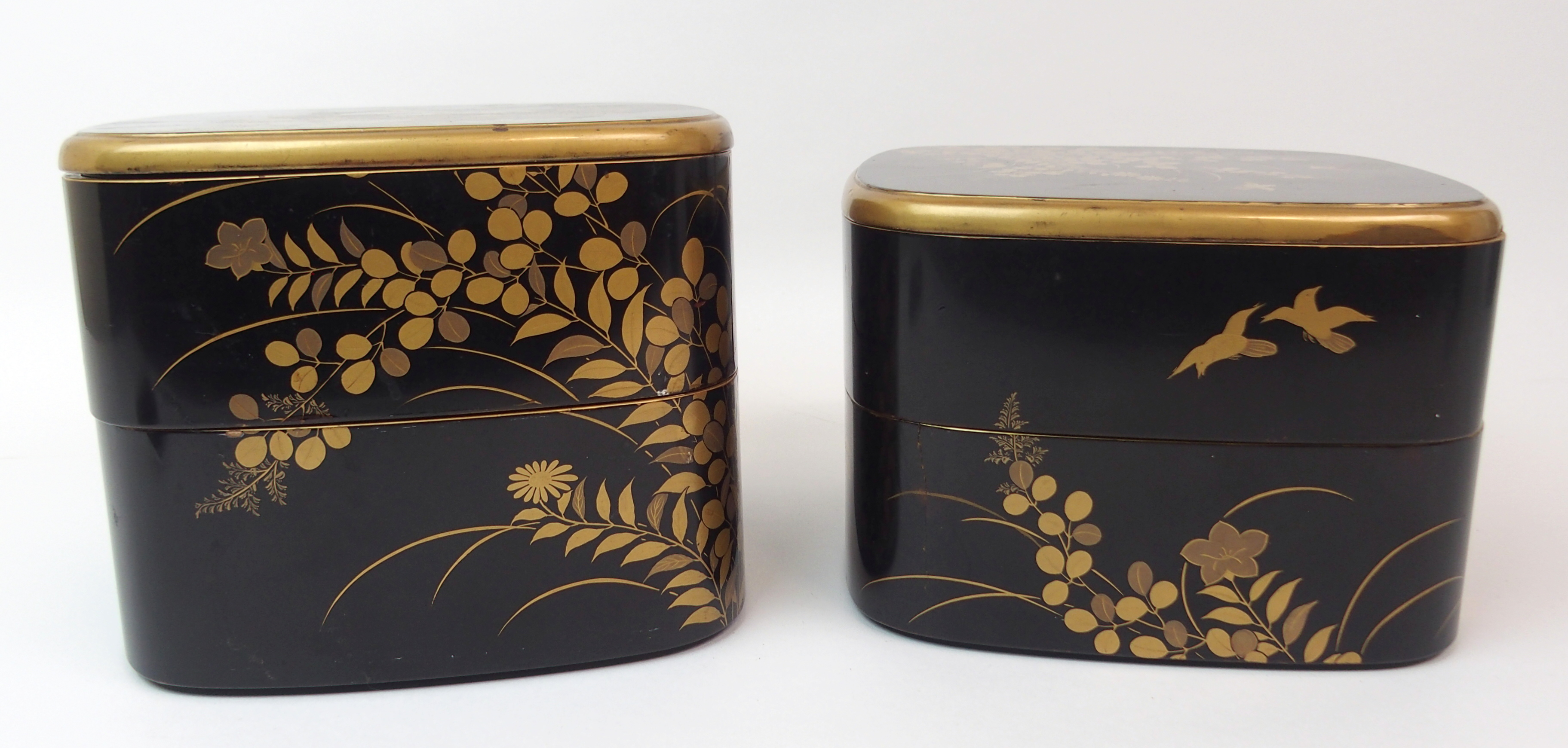 TWO BLACK AND GOLD LACQUERED TWO-SECTION BOXES decorated with birds amongst foliage (cracks and - Image 9 of 14