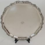 A FINNISH SILVER SALVER marked 813H with date mark for 1962, of circular form with foliate decorated