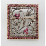 A ROSE CUT DIAMOND AND RUBY FLORAL BROOCH dimensions 3.5cm x 3cm, weight 13gms Condition Report: