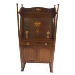 AN ART NOUVEAU MAHOGANY AND INLAID WRITING BUREAU with foliate medallions, set with a pair of