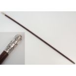 A LONDON IMPERIAL VOLUNTEER'S SWAGGER STICK the stained wood stem with silver finial with crest