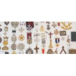 A COLLECTION OF MASONIC AND THE ORDER OF ST JOHN BADGES medals and insignia with a booklet on the