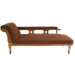 AN ARTS AND CRAFTS OAK CARVED CHAISE LONGUE with scroll art square tapering legs, 76cm high x