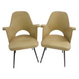A PAIR OF 1950'S CREAM VINYL SALON CHAIRS with metal legs, registered design number 898784, 86cm