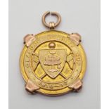 A 9CT GOLD 1916-17 GLASGOW CHARITY CUP WINNERS MEDAL the obverse inscribed Glasgow Charity Cup
