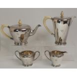 A FOUR PIECE SILVER TEA SERVICE by Edward & Sons, London 1926, of tapering cylindrical form with