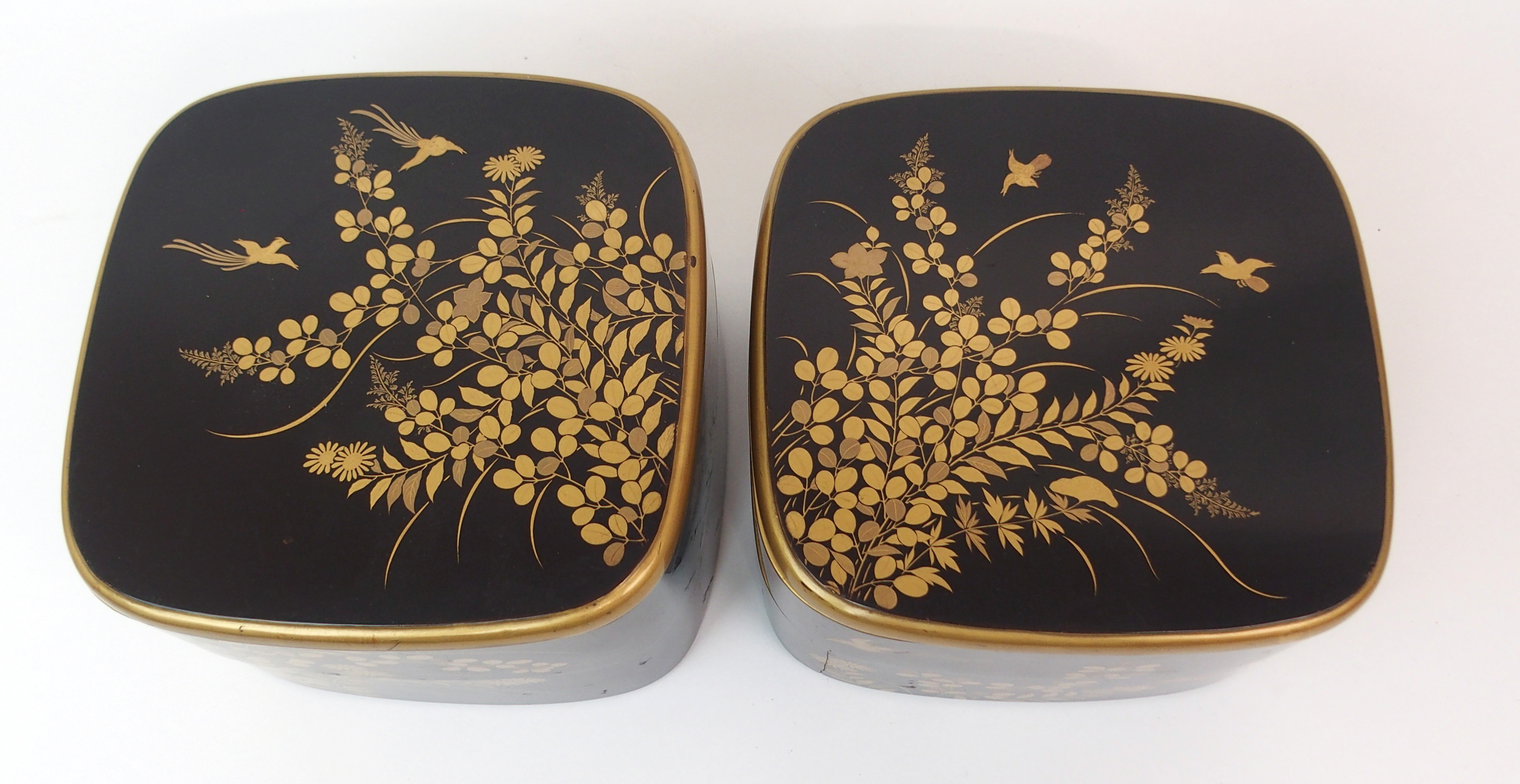 TWO BLACK AND GOLD LACQUERED TWO-SECTION BOXES decorated with birds amongst foliage (cracks and - Image 8 of 14