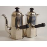 A SILVER TWO-PIECE CAFE AU LAIT SET by Harrison Bros Howson (George Howson), Sheffield marks, rubbed