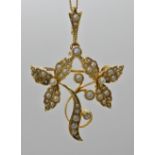 A 15CT GOLD AND PEARL EDWARDIAN PENDANT BROOCH with removable brooch fitting for comfort of wear,