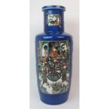 A CHINESE ROULEAU BLUE GROUND VASE with famille verte panels of court, landscape, birds, flowers and