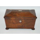 A VICTORIAN ROSEWOOD SARCOPHAGUS SHAPED TWO DIVISION TEA CADDY with mother of pearl inset with