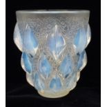 A RENE LALIQUE RAMPILLON PATTERN VASE the clear and opalescent glass with traces of blue staining,