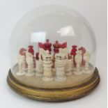 A CHINESE EXPORT IVORY CHESS SET of typical form, one red stained set, pawns, 5cm high, Kings, 8cm