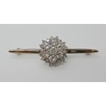 A WHITE METAL DIAMOND CLUSTER BROOCH set with estimated approx 2.60cts of brilliant cut diamonds,