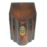 A GEORGE III MAHOGANY SERPENTINE KNIFE BOX with brass escutcheon, with brass handles, 24.5cm wide