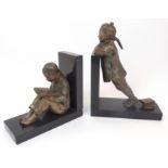 HESTER MABEL WHITE (ACT.C.1898-1948) A pair of gilded bronze bookends, one modelled as a seated