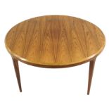 A SILKBORG CIRCULAR ROSEWOOD COFFEE TABLE on tapering legs, 100cm diameter A CITES Certificate is in
