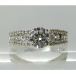 An 18ct white gold diamond engagement ring, set with estimated approx combined diamond weight of